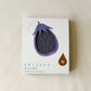 Packaged purple towel with a cut-out of an eggplant