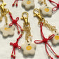Tangerine Lucky Knot Charm