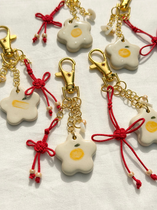 Tangerine Lucky Knot Charm