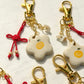 Tangerine Lucky Knot Charm