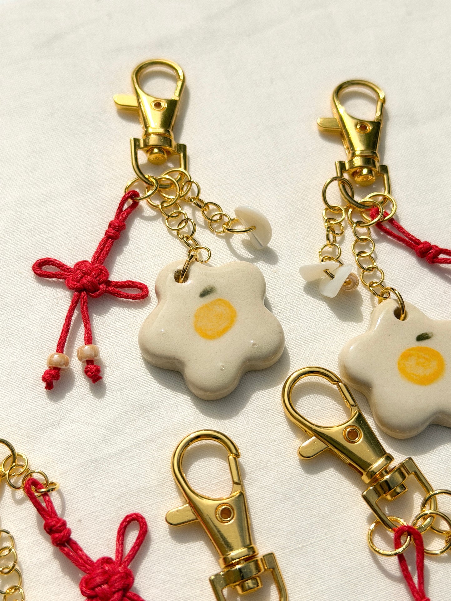 Tangerine Lucky Knot Charm