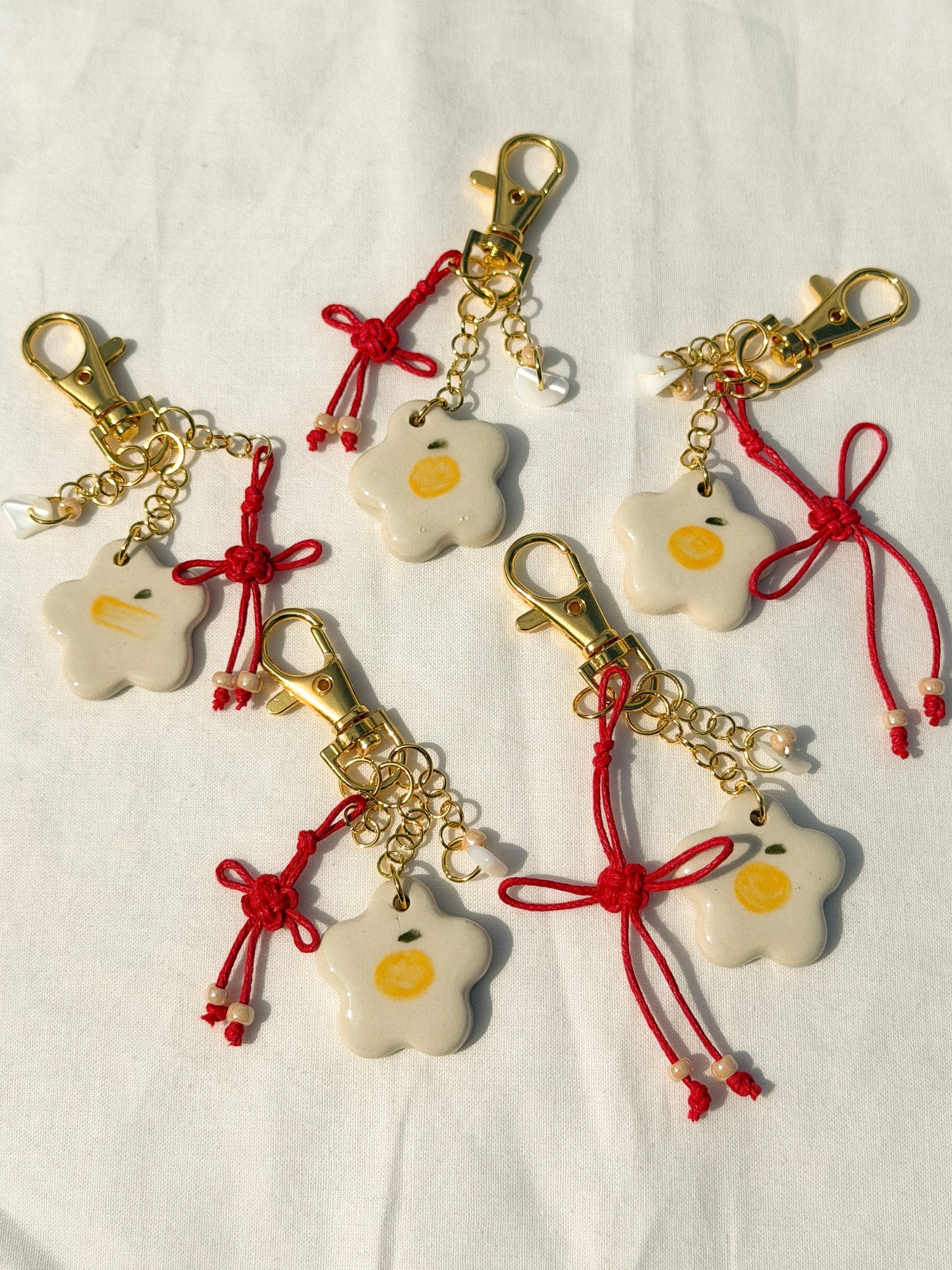 Tangerine Lucky Knot Charm