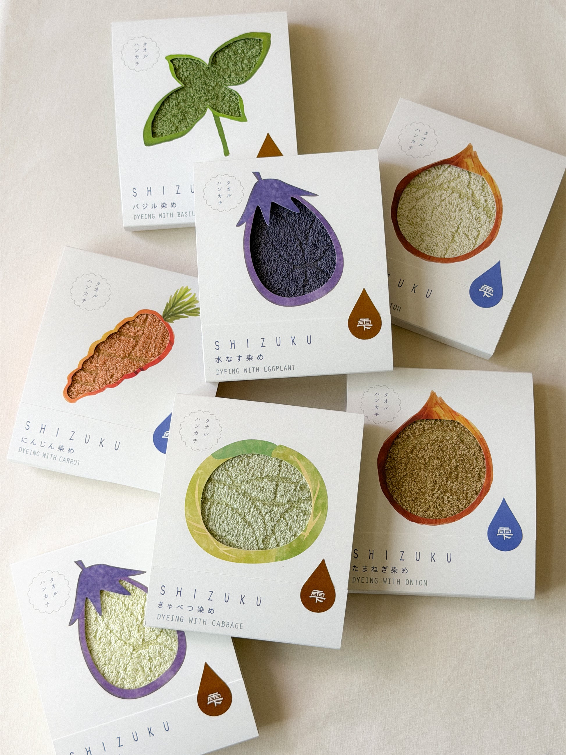 Layout of various colorful Shizuku towels that are naturally dyed with vegetables
